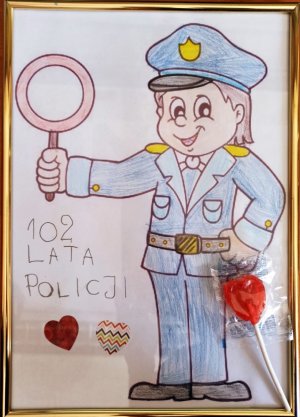 Zdjęcie przedstawia rysunek wykonany przez 5-latkę,która odwiedziła strzelecka komendę.